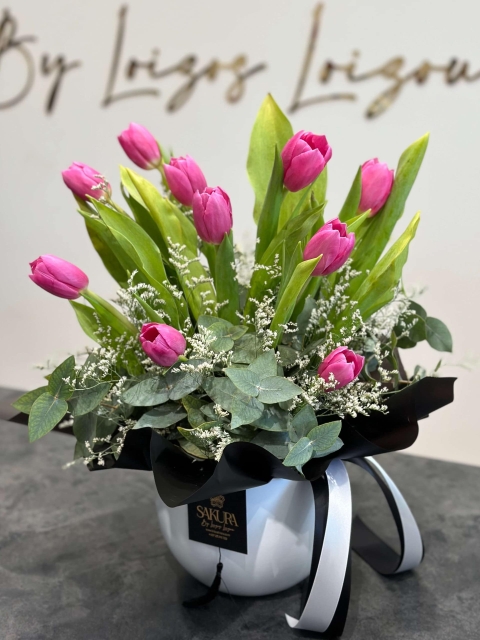 Luxury tulips in a white ceramic pot